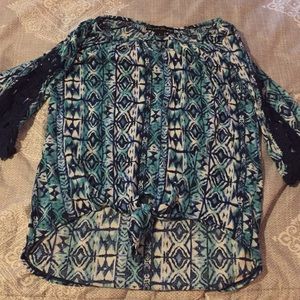 Blue patterned tie top with decorative sleeves